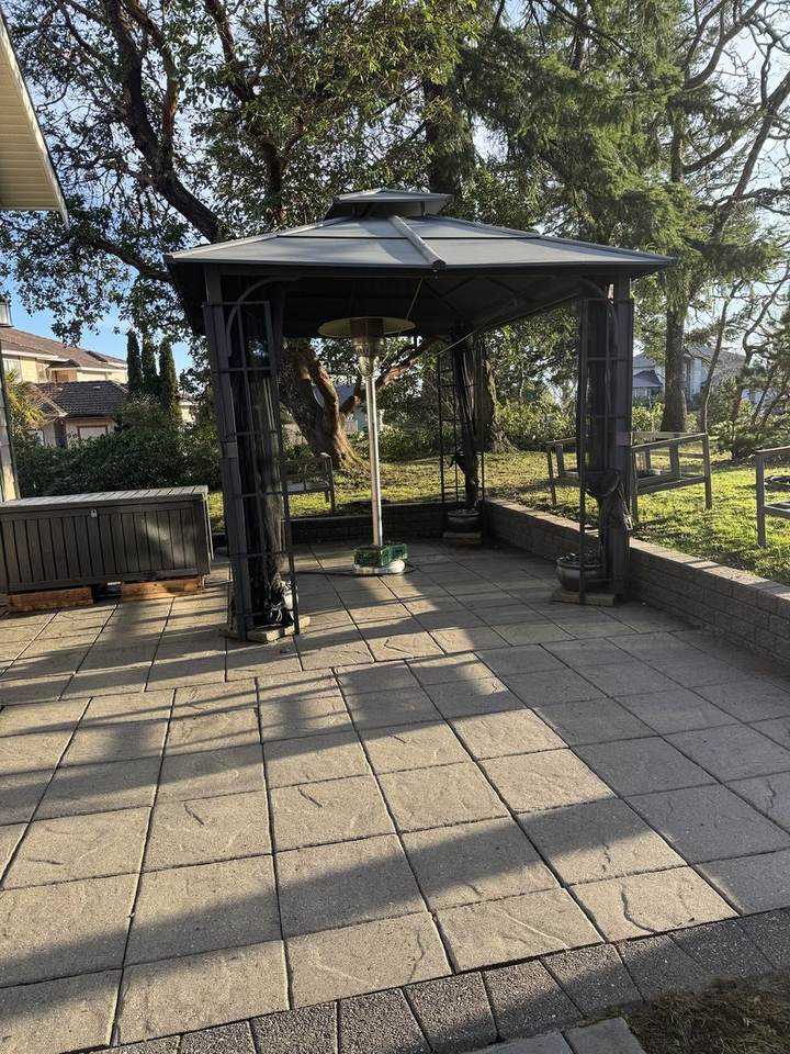 Paver patio under the gazebo after pressure washing